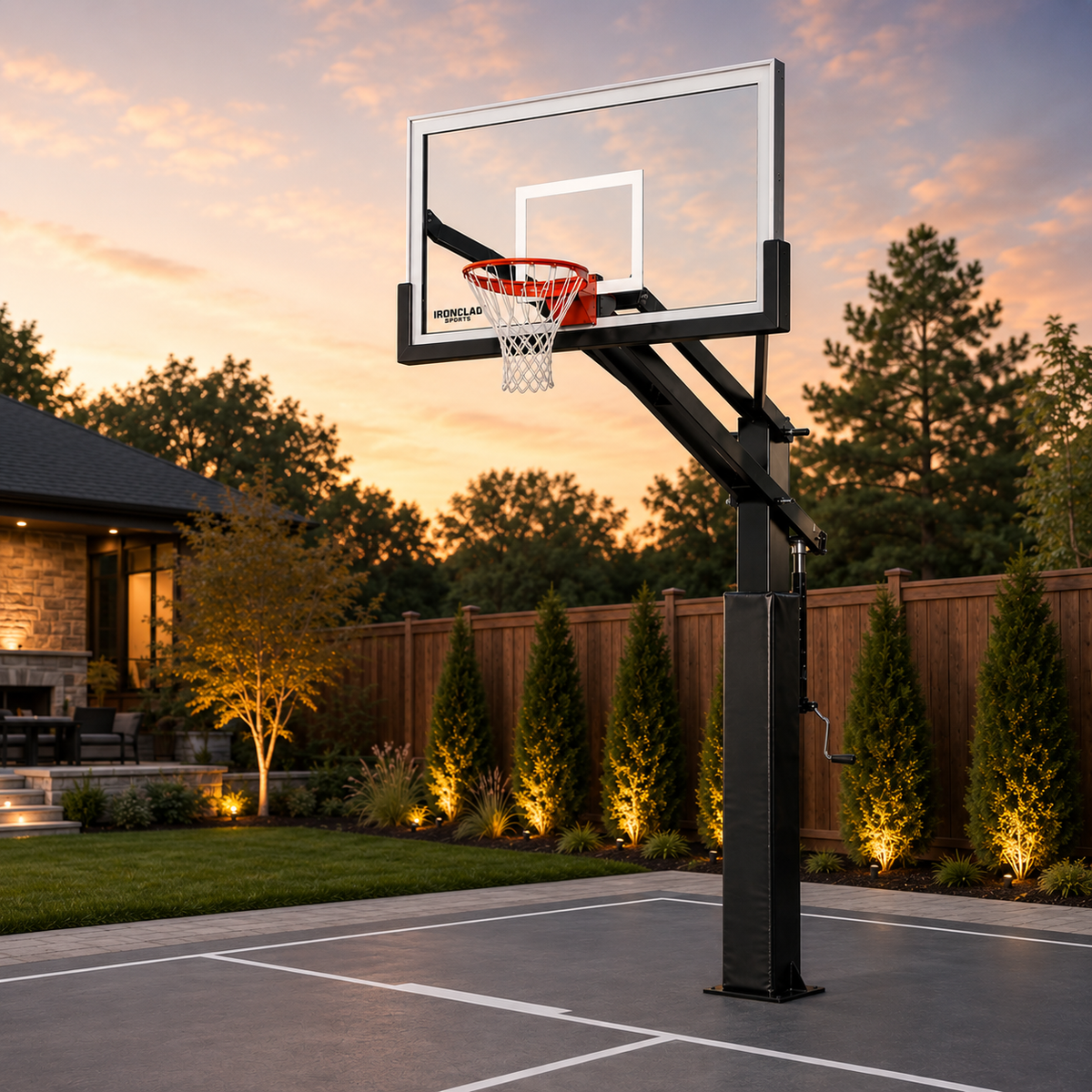 Premium in-ground basketball hoop with glass backboard on a residential outdoor basketball court