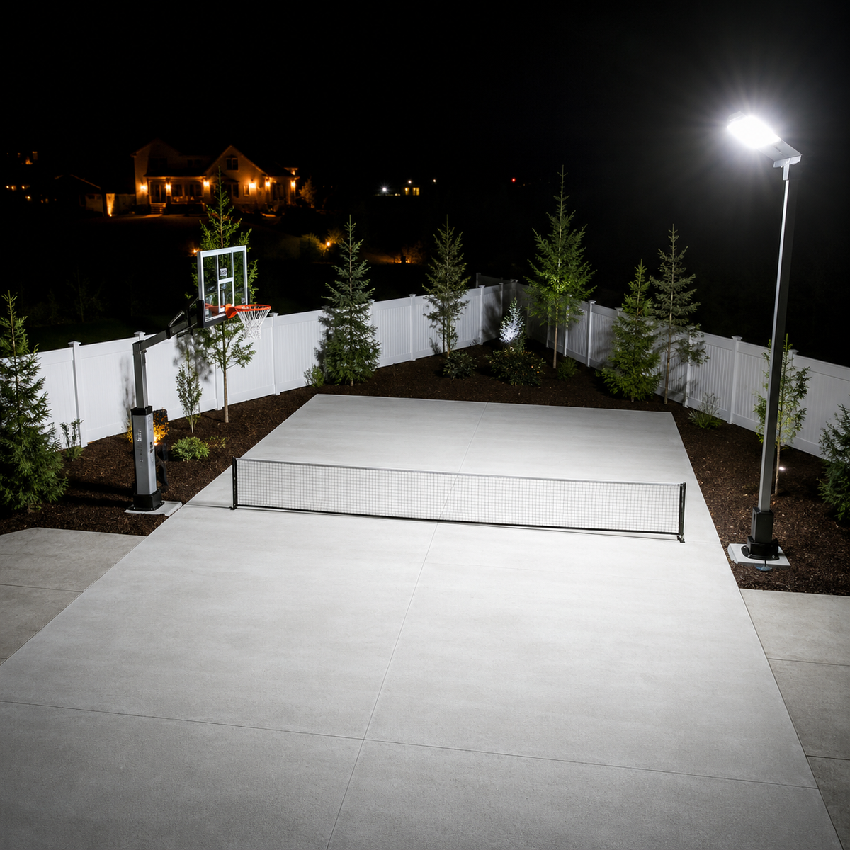 Backyard sports court illuminated by a Dominator solar light